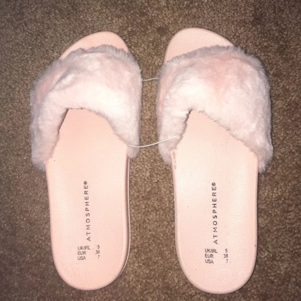 Pink faux fur slides